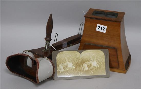 Two stereo viewers and a collection of stereo cards
